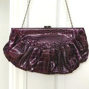 Purple faux snake skin clutch purse